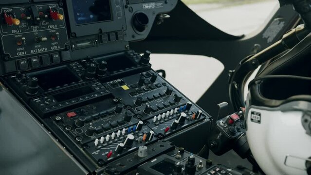 Control panel inside helicopter cockpit - dolly shot
