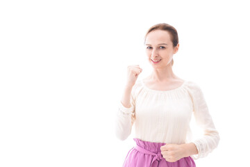 ガッツポーズをする若い女性