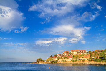 Seaside cityscape - view of the embankment with a cafe in the Old Town of Nesebar, on the Black Sea coast of Bulgaria