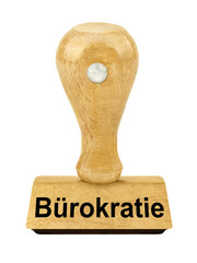 Stempel aus Holz und Bürokratie auf weissem Hintergrund