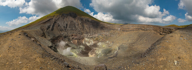 Panoramic view and natural landscape of the active crater of Lokon volcano, one of the twin volcanoes located in the Tondano plain near Tomohon, Minahasa Regency, North Sulawesi, Indonesia