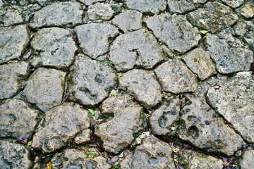 The surface of cobblestone street in Naha.