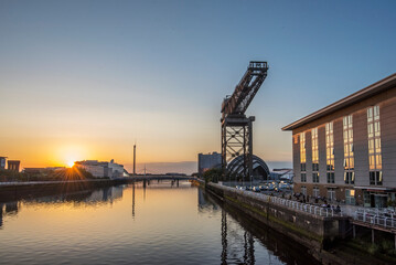 Fototapeta na wymiar View of Finnieston Crane and River Clyde in central Glasgow at sunset. 