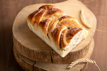 braided bread decorated with grated coconut