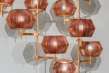 Contemporary geometric chandelier with glowing lamps