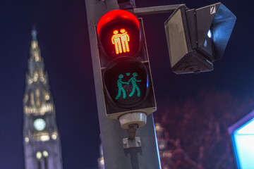 Traffic lights in Vienna of couple crossing with love