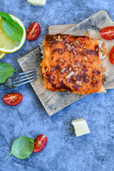  Fish bake preparated in Ticino style  with sweet gorgonzola  cheese and tomato crust
