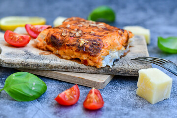  Fish bake preparated in Ticino style  with sweet gorgonzola  cheese and tomato crust