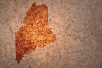 map of maine state on a old vintage crack paper background