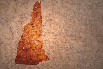 map of new hampshire state on a old vintage crack paper background