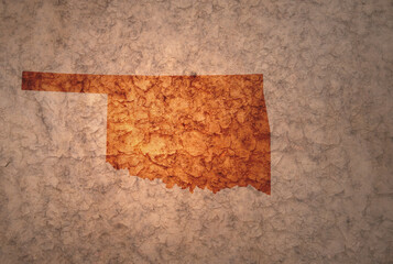 map of oklahoma state on a old vintage crack paper background