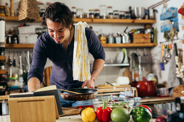 man preparing food in his kitchen