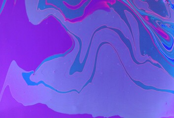 Abstract blue marble background. Acrylic texture with marble pattern. Mixing colors creates an interesting structure. It is well suited for laptop background and wallpaper, fabric