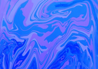 Abstract blue marble background. Acrylic texture with marble pattern. Mixing colors creates an interesting structure. It is well suited for laptop background and wallpaper, fabric