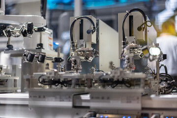 Fototapeta na wymiar Robot arm working in car factory
