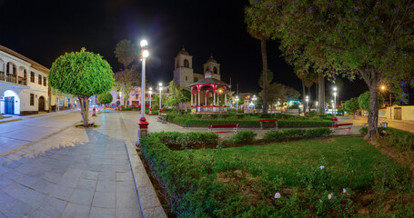 Night image of the central park of the town of Caraz, in Ancash, Peru