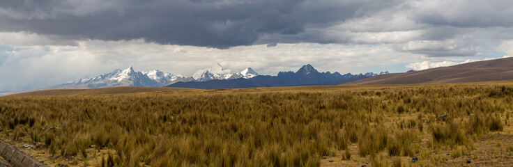 White mountain range seen from the puna of Conococha, with great plains and imposing snowy...