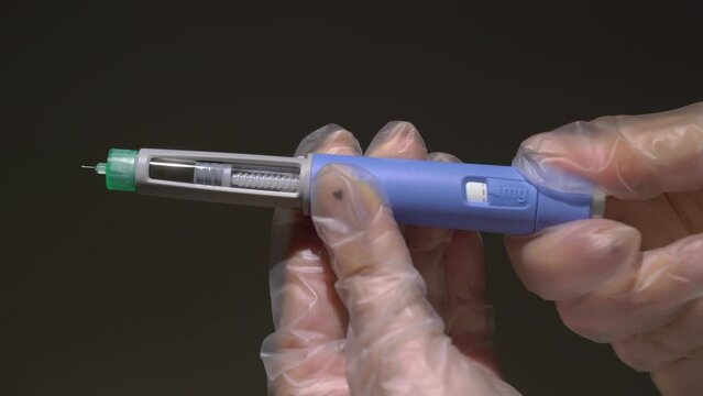 Doctor, nurse, patient. Medication insulin, subcutaneous injection for diabetic.