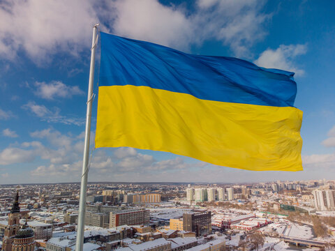Ukrainian flag in the wind. Blue Yellow flag in the city of Kharkov