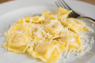 ravioli pasta on light plate. Italian food