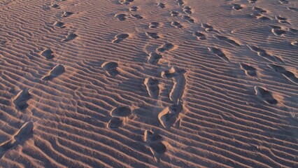 Foot marks on the sand