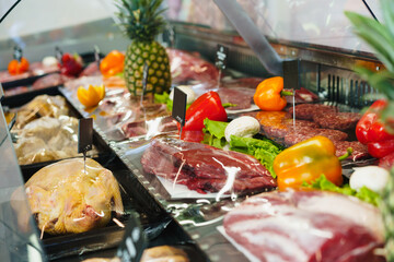 Fresh raw good quality meat on counter in Butcher shop