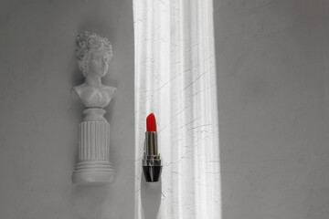 Red lipstick on a white textured background