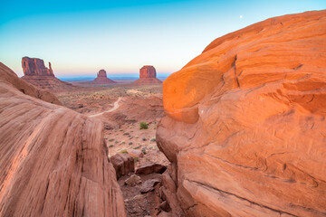 Beautiful sunset over the West, Mitten and East Butte in Monument Valley. Utah, USA.