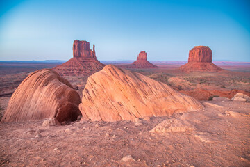Beautiful sunset over the West, Mitten and East Butte in Monument Valley. Utah, USA.