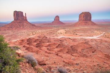 Beautiful sunset over the West, Mitten and East Butte in Monument Valley. Utah, USA.