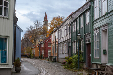 Old wooden houses line Nedre Bakklandet, Bakklandet, Trondheim, Trøndelag, Norway