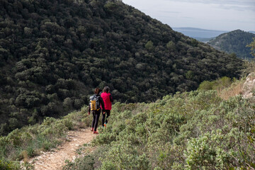 Fototapeta na wymiar family hiking in Puig de Cura, Randa, Algaida, Randa, Algaida, Mallorca, Balearic Islands, Spain