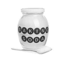 Spoon and jar with baking soda on white background