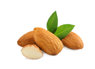 Organic almond nuts and green leaves on white background. Healthy snack