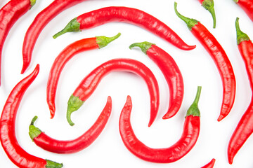Red hot chili peppers on a white background. food figures. Vitamin vegetable food