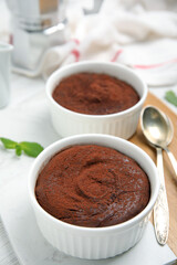 Delicious fresh chocolate fondant on white table