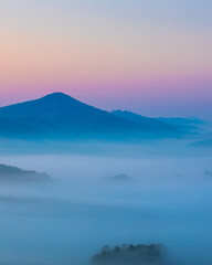 Beautiful arial landscape of  amazing mountain in fog.