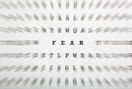 Word Fear in crossword letters with motion focus effect
