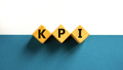 KPI, key performance indicator symbol. Concept word KPI, key performance indicator on wooden cubes on beautiful white background, copy space. Business, KPI, key performance indicator concept.