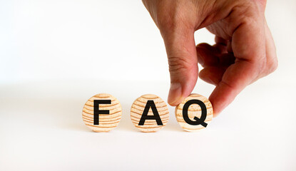 FAQ frequently asked questions symbol. Concept words FAQ frequently asked questions on wooden circles on a beautiful white background. Business and FAQ frequently asked questions concept.