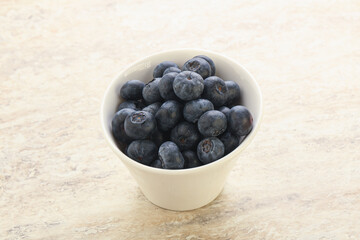 Sweet ripe blueberry heap in the bowl