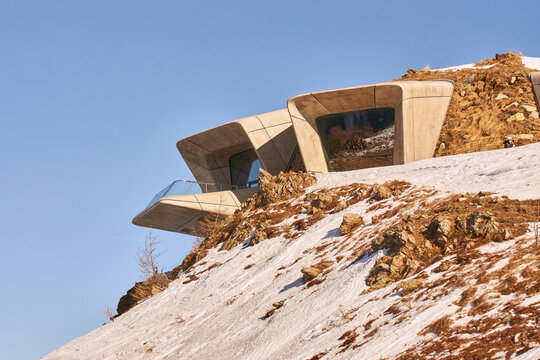 Plan de Corones, Italy - January 19 2022: Messner Mountain Museum (MMM Corones) designed by architect Zaha Hadid on the summit plateau Kronplatz, a famous ski resort in Dolomite Alps