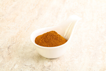 Dry Paprika powder in the bowl