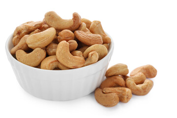 Bowl and tasty organic cashew nuts isolated on white