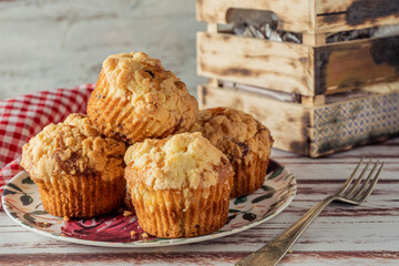 Exquisite homemade cupcakes or muffins with blueberries and blackberries. Homemade food, natural food.