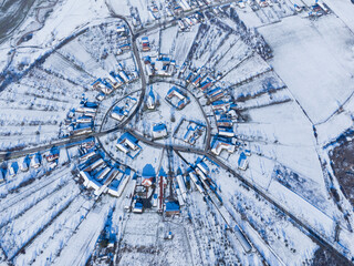 Charlotenburg, Romania the only round village in the country with a drone view in winter season.