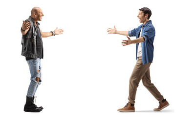 Full length profile shot of two men walking towards each other with arms wide open