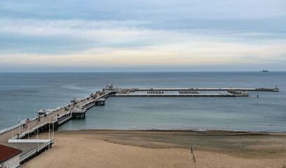 Fototapeta na wymiar Old wooden pier in Sopot, Baltic Sea coast