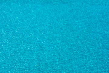 Pool water background, blue wave abstract or rippled water texture background.