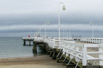 Naklejka premium Old wooden pier in Sopot, Baltic Sea coast